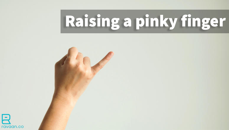 Raising a pinky finger معنی